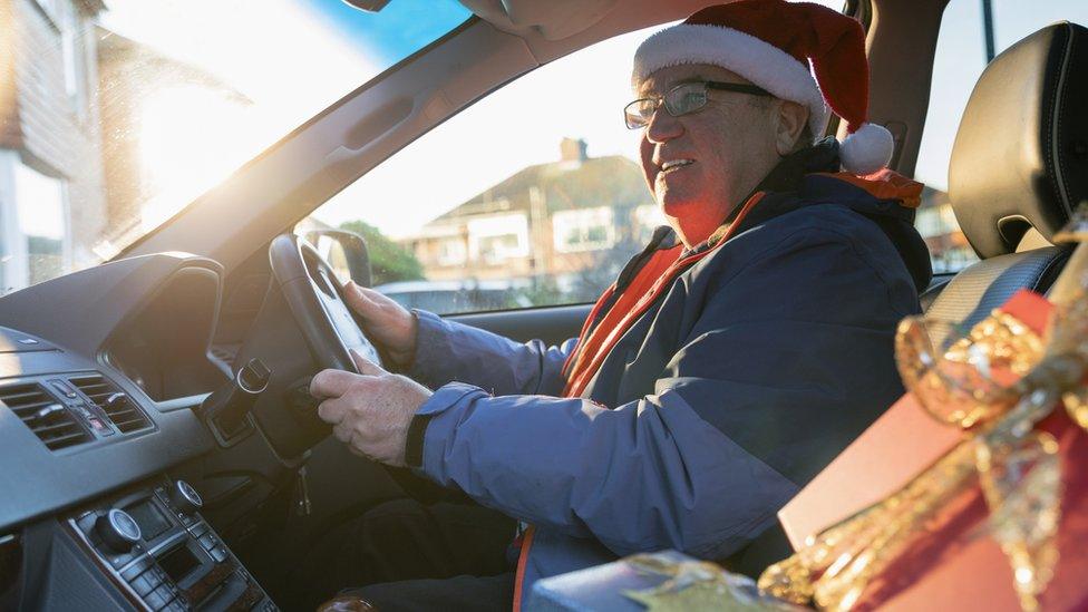 Man driving at Christmas