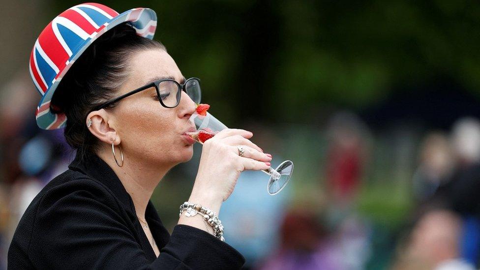 Woman drinking fizz