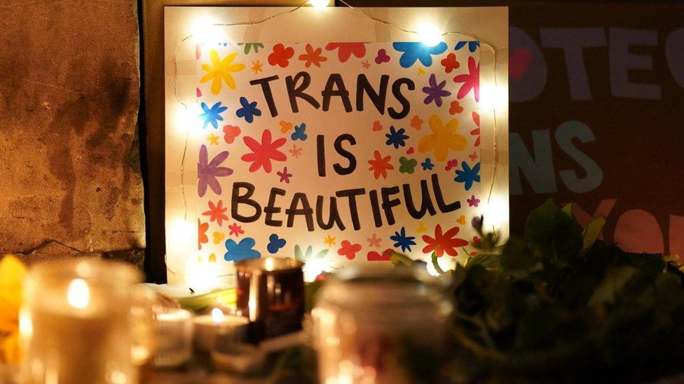 Candles with a sign outside the Department of Education in London as members of the public attend a candle-lit vigil in memory of transgender teenager Brianna Ghey, who was fatally stabbed in a park on Saturday.