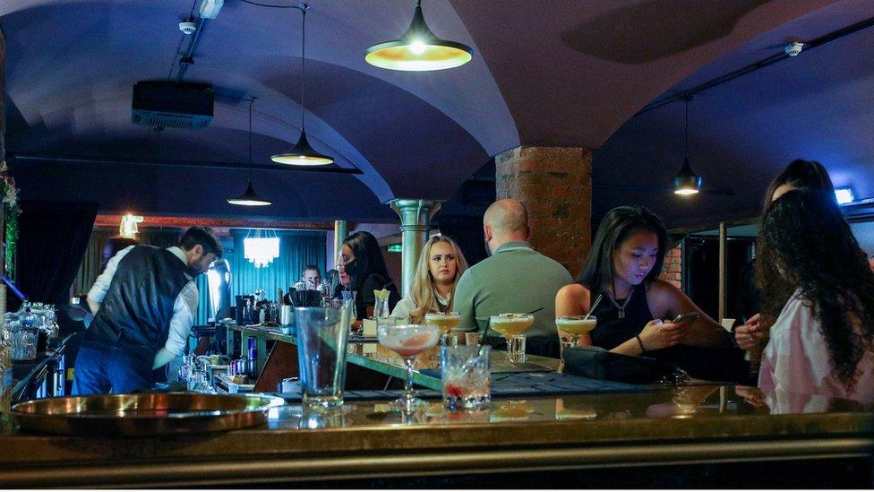 People enjoying drinks in Liverpool