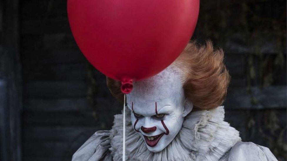 This is a photo of Pennywise the clown in It.