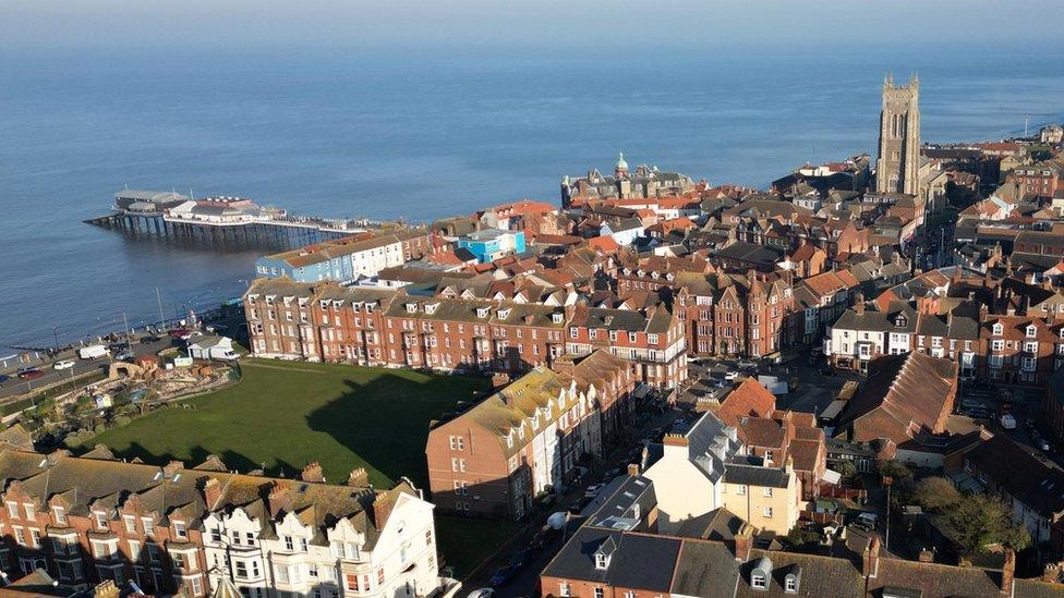 Aerial view of Cromer, including the parish church and the pier