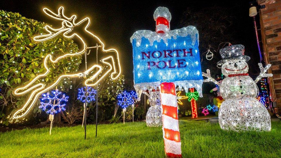 Christmas lights and North Pole sign