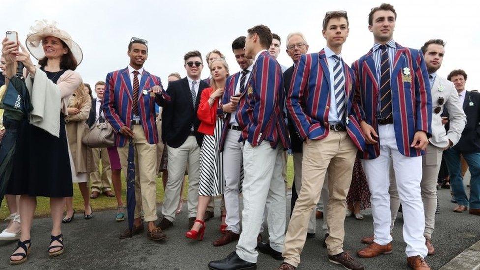 Spectators gather on the Berkshire side of the River Thames during day one of the Henley Royal Regatta