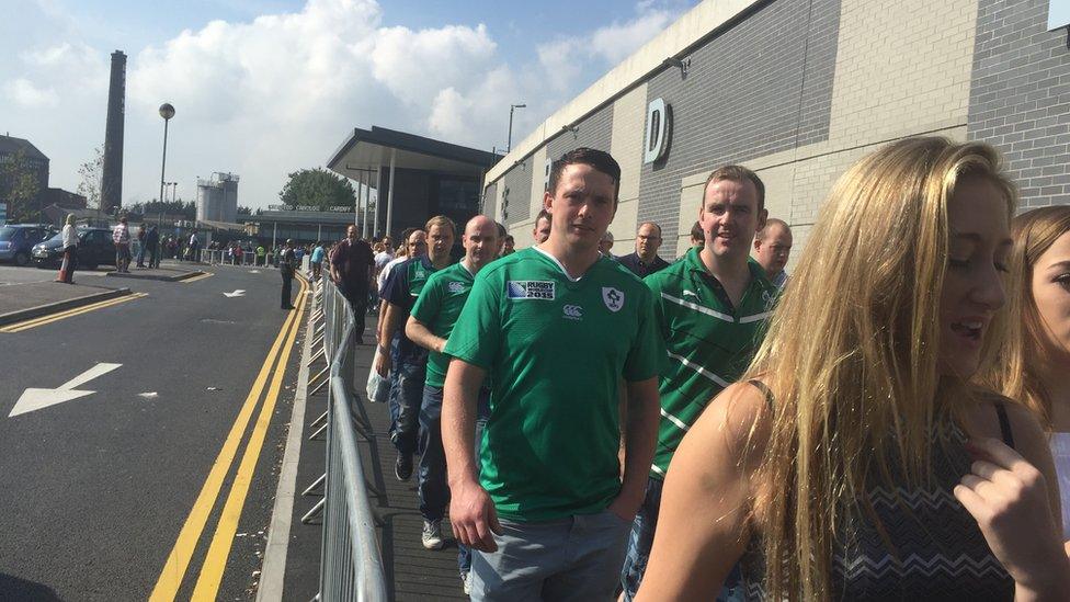 Fans arrive at Cardiff Central Station