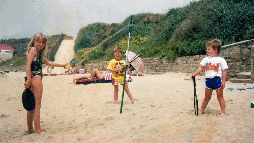 Andy Murray playing on the beach