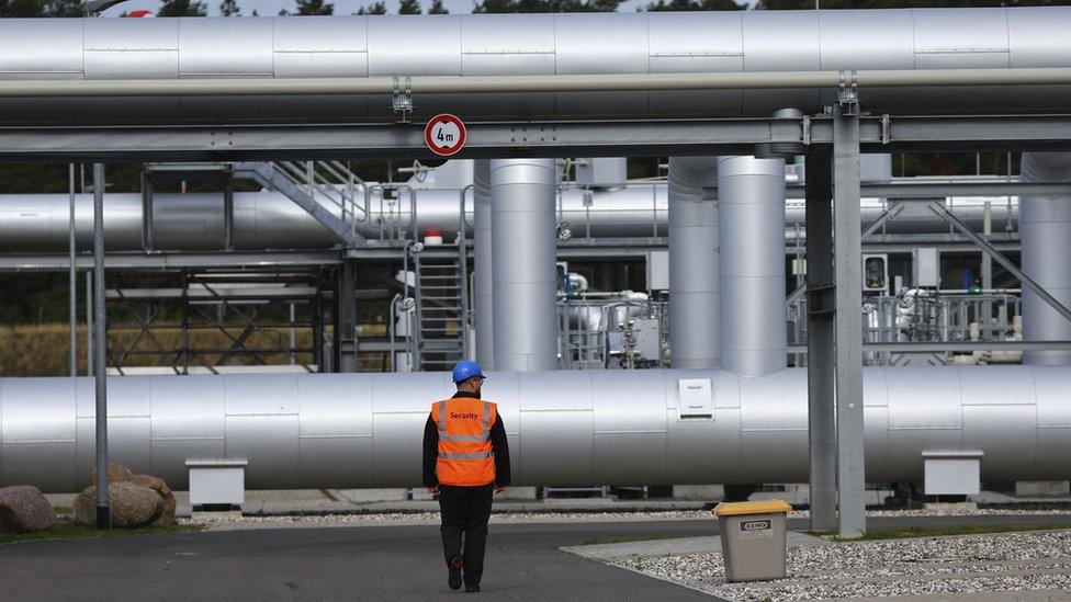 Security walks in front of the landfall facility of the Baltic Sea gas pipeline Nord Stream 2 in Lubmin, Germany, September 19, 2022