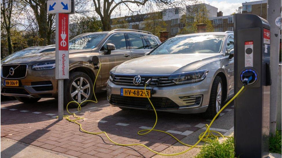 Electric cars being charged