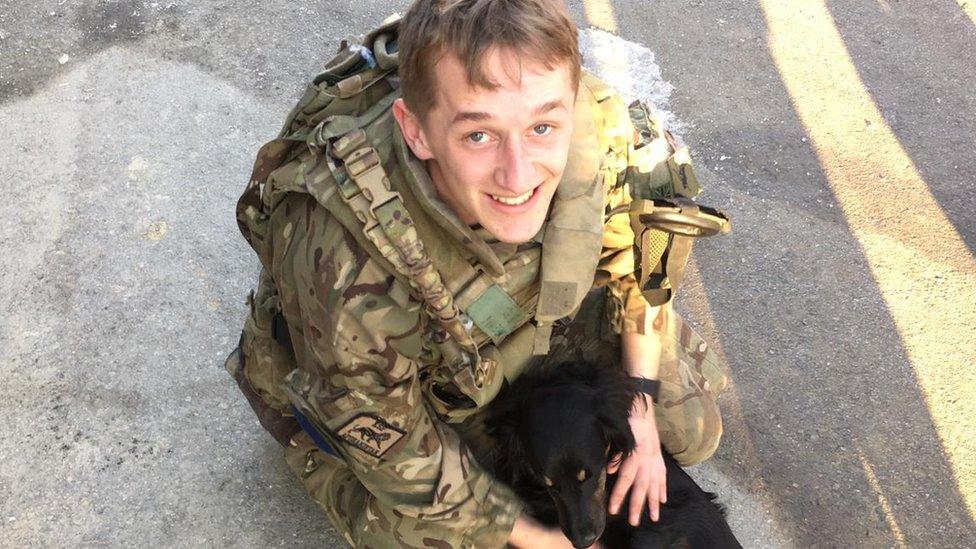 Pte Joseph Berry with a dog