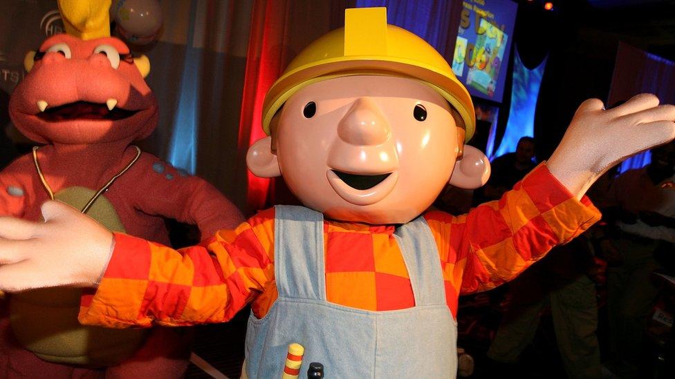 A person in a Bob the Builder costume