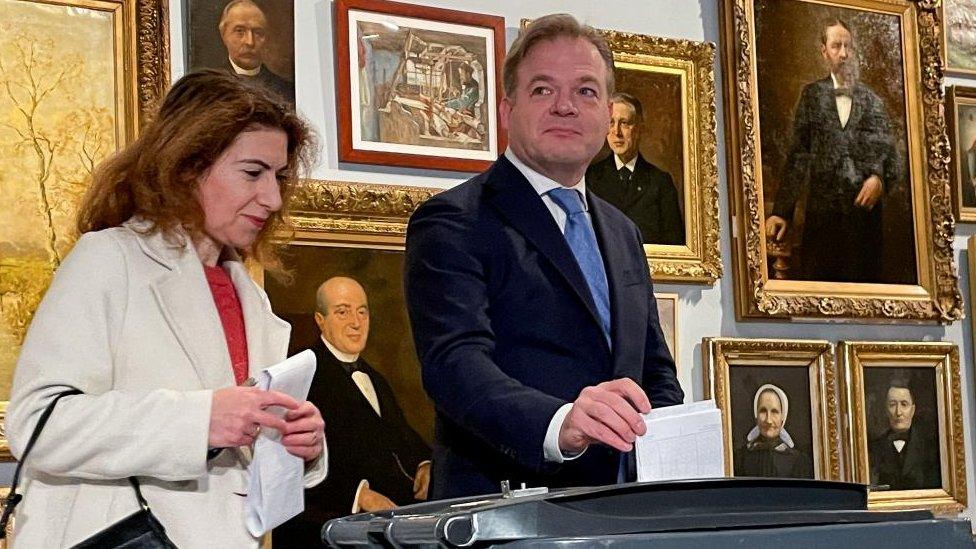 Founder of the new centre-right NSC party Pieter Omtzigt casts his vote in the Dutch parliamentary elections, next to his wife Ayfer Koc, in Enschede