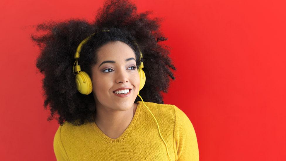 Woman wearing headphones