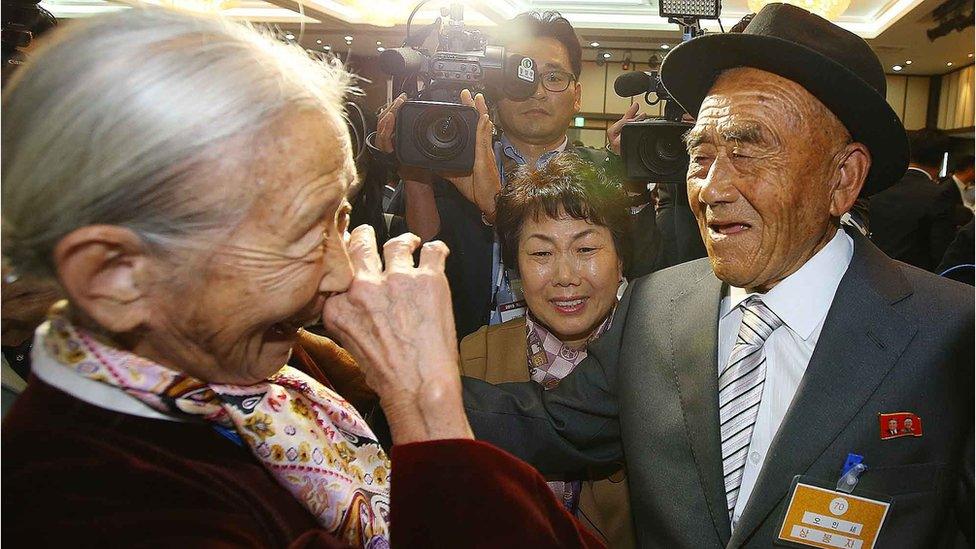 South Korean Lee Sun-Gyu (L), 85, smiles with her North Korean husband Oh In-Se (R), 83, during a separated family reunion meeting at the Mount Kumgang resort on the North"s southeastern coast on October 20, 2015.