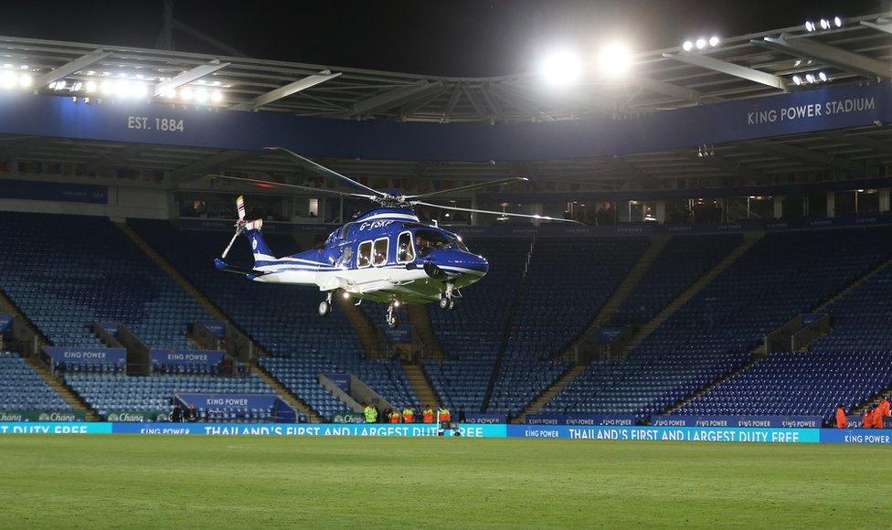 The helicopter of Leicester City owner Vichai Srivaddhanaprabha lands on the pitch at the end of the game before making it's final fateful journey after the Premier League match between Leicester City and West Ham United at The King Power Stadium on October 27, 2018 in Leicester, United Kingdom