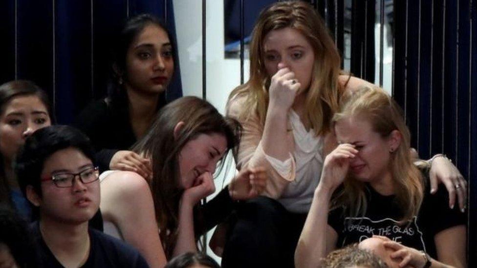 Clinton supporters react as election results trickle in