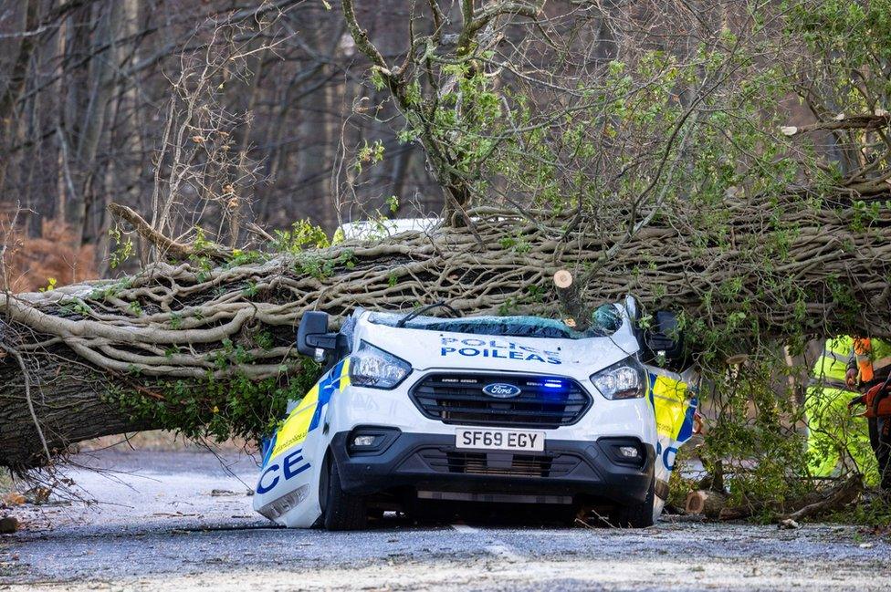 Crushed police van