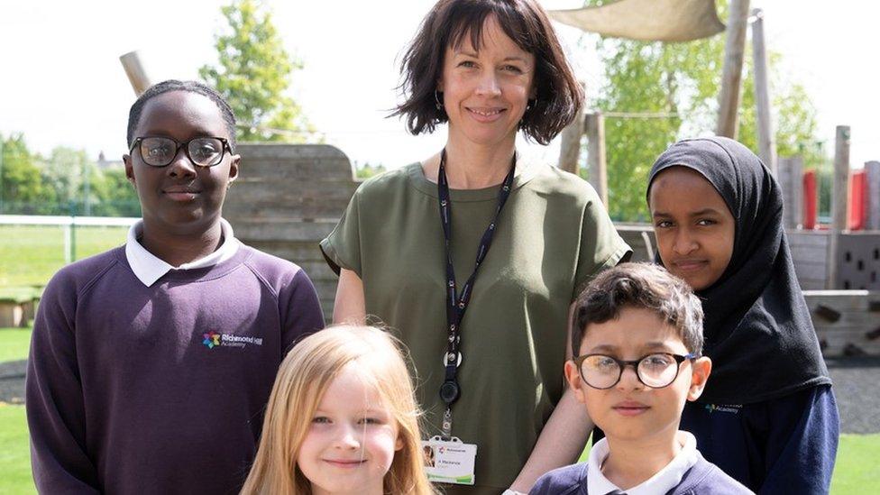 Headteacher Anna Mackenzie and school pupils