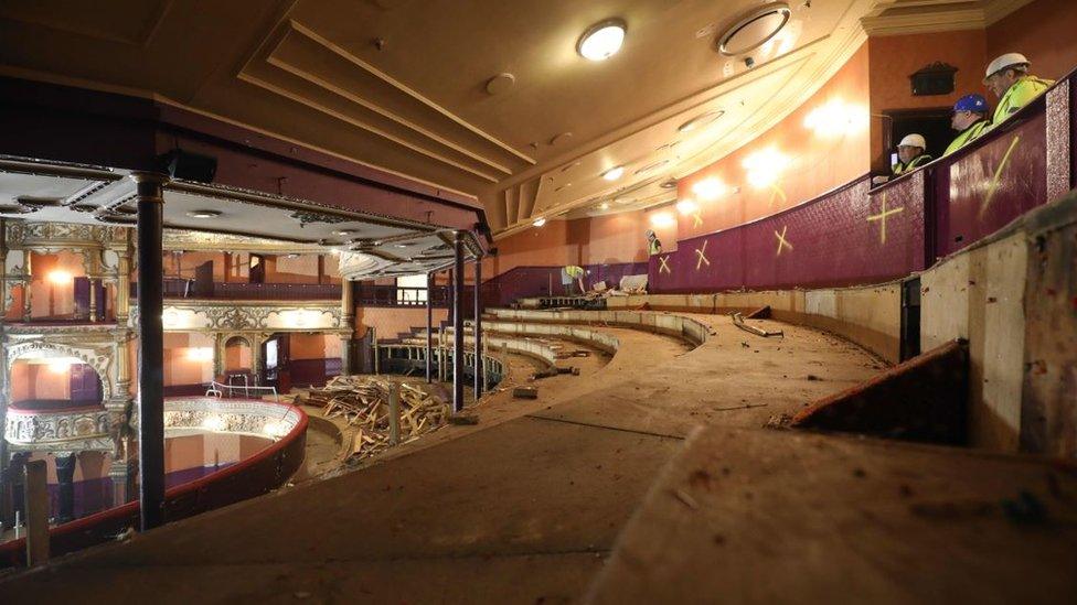 Developers surveying the Opera House stalls. The seating and carpets have been removed