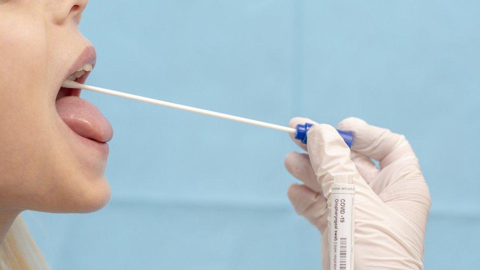 A woman having a covid test