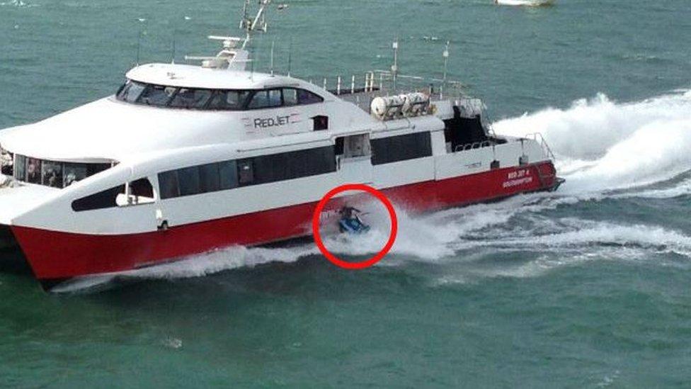 A sea scooter crashing into a ferry