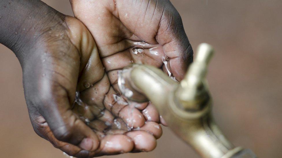 Child collecting fresh water