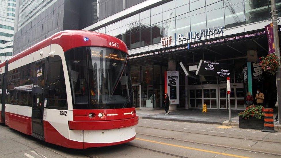 Photo of Toronto streetcar in front of TIFF Building