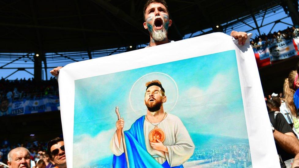 Argentine fan with Messi picture