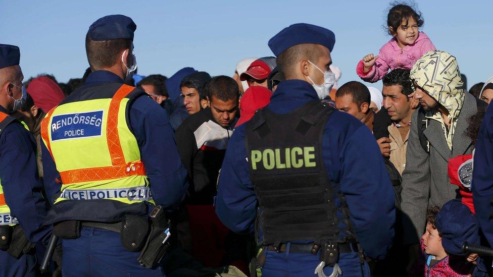 Roszke, Hungary - refugees face police, 7 Sep 15