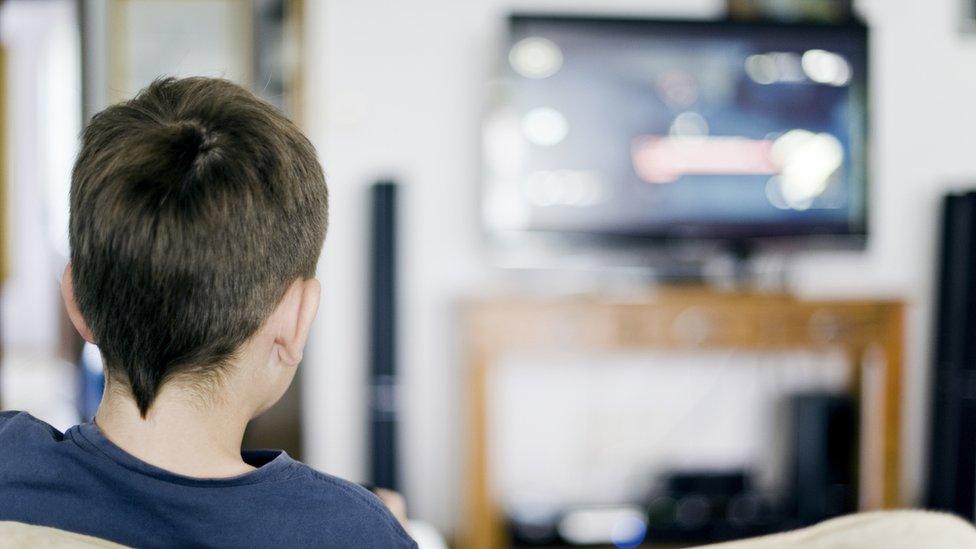 Boy watching TV