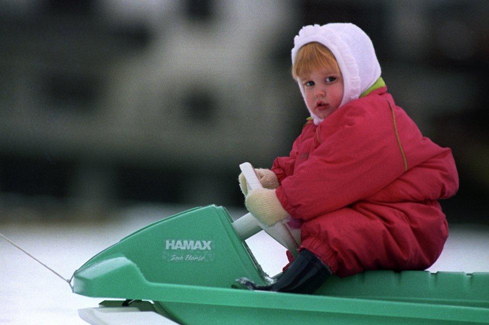 Princess Beatrice takes to the controls of a sledge on the slopes near the Swiss village of Klosters