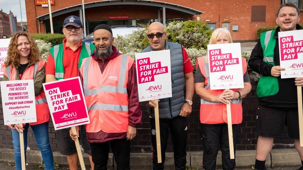 Royal Mail workers on strike in Manchester on Fri 26 Aug, the first day of a series of strikes in summer 2022.