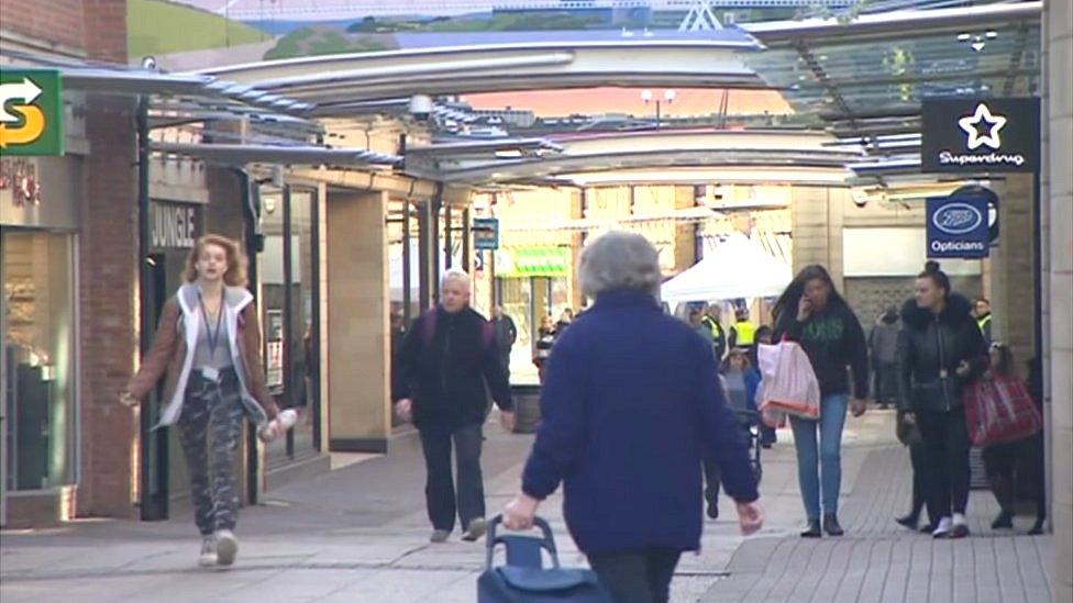 Shoppers in Wellington Square