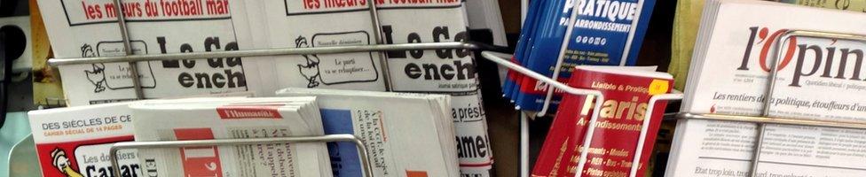 Newspapers on sale in a Parisian kiosk, 22 April