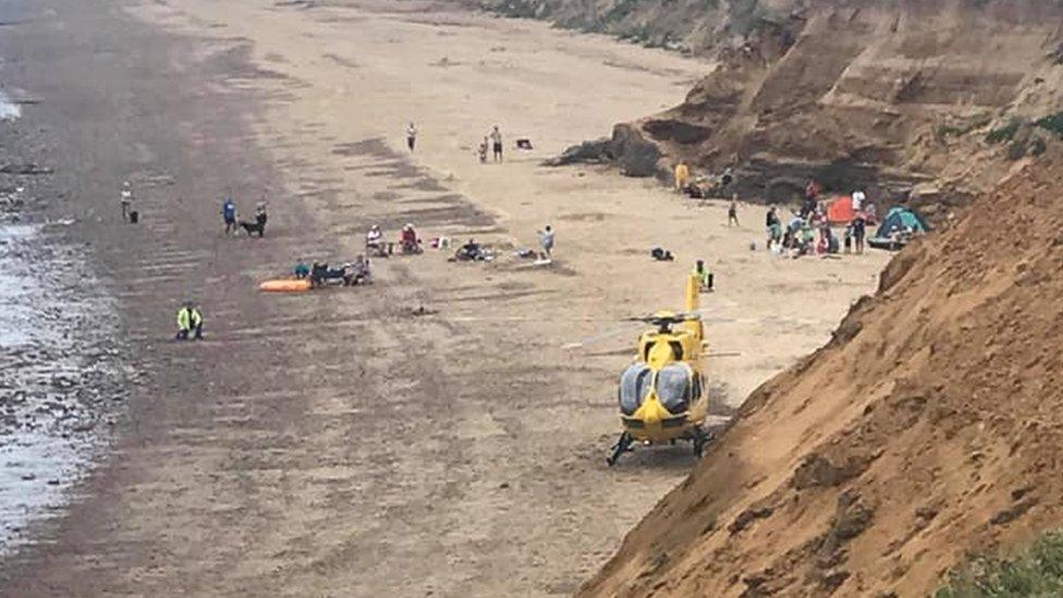 Air ambulance taking off from Happisburgh beach