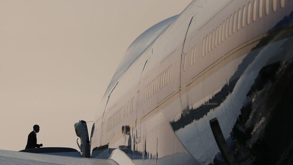 President Barack Obama boards Air Force One at Tampa International Airport in Tampa, Fla., Tuesday, Dec. 6, 2016.