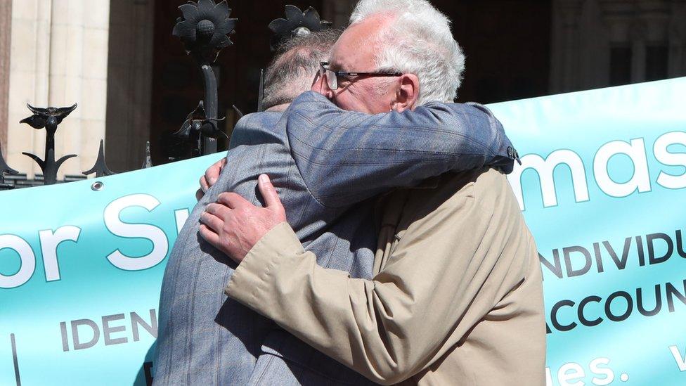 Cleared: Noel Thomas hugs a fellow postmaster outside Royal Courts of Justice in April 2021