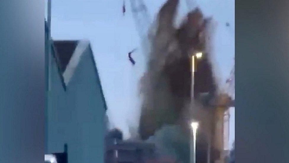 A huge blast is heard and debris seen rising into the air from the site of a World War Two bomb.