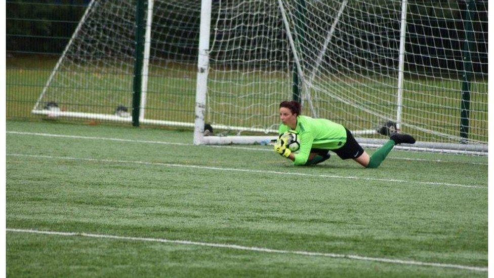 Picture of Rachel saving a goal