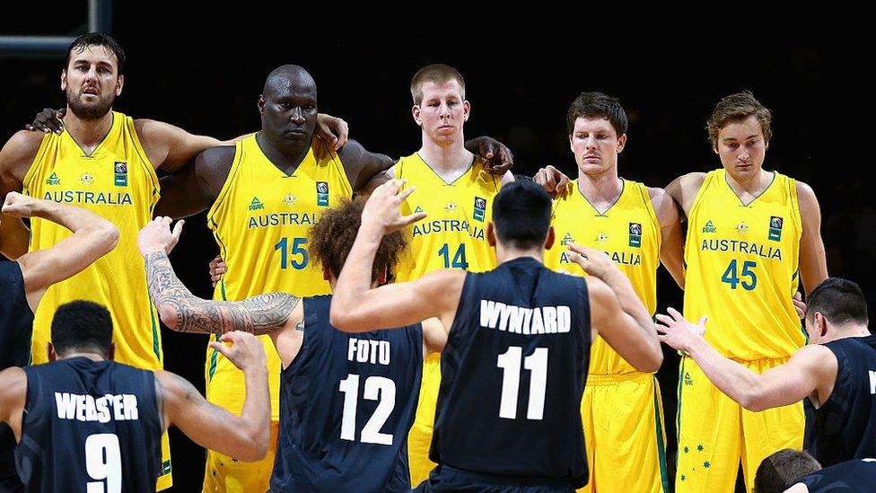 Boomers players look on as the Tall Blacks perform the Haka during the game one match between the Australian Boomers and New Zealand Tall Blacks at Rod Laver Arena on 15 August 2015 in Melbourne, Australia.