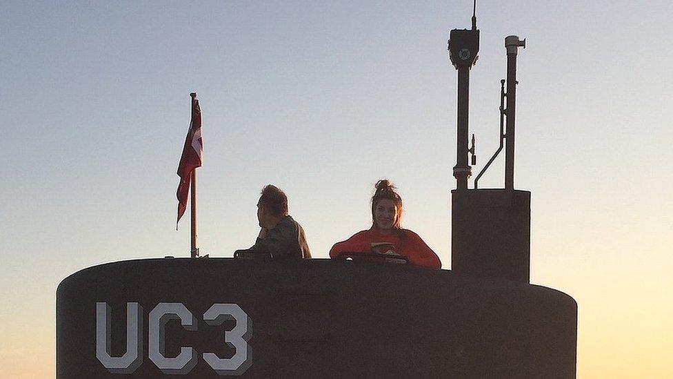 Peter Madsen next to Kim Wall on submarine