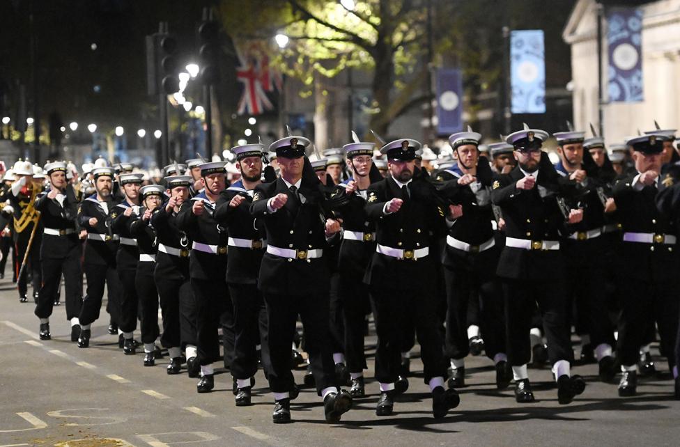 Royal Navy personnel march up Whitehall during the rehearsal for the Coronation in London.