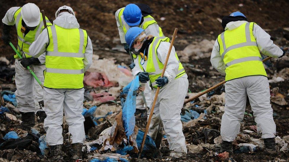 Detectives sifting through rubbish