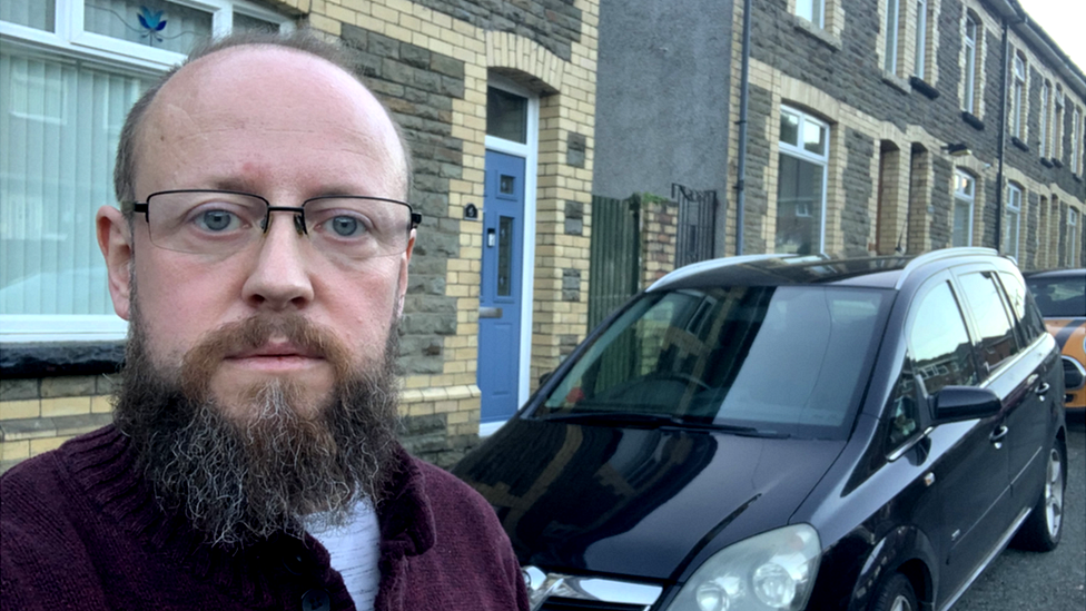 Ian Pugh outside with his repaired car