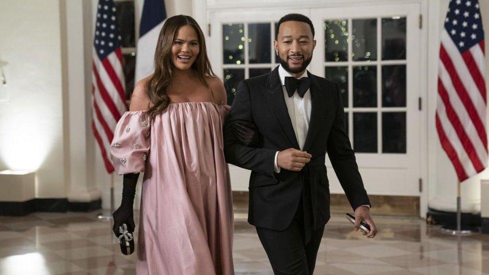 US singer John Legend and US model Chrissy Teigen arrive at the state dinner