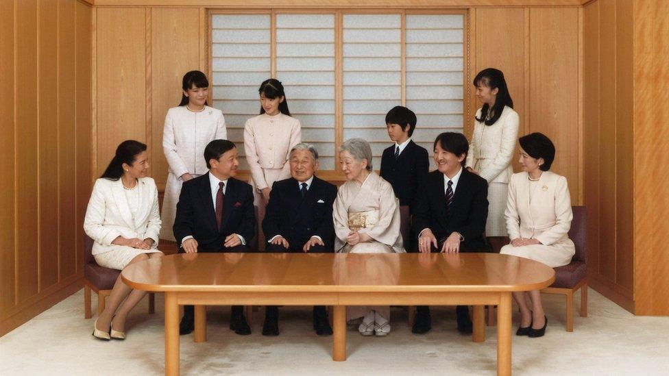 Japanese Emperor Akihito and Empress Michiko smile with their family members during a photo session for the New Year at the Imperial Palace in Tokyo, Japan in this handout picture taken on 28 November 2016