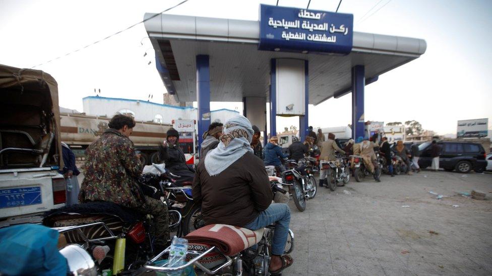 Motorcyclists queue at a petrol station amid fuel shortages in Sanaa, Yemen (10 November 2017)