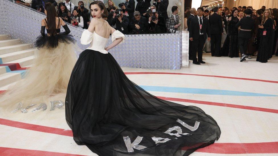 Lily Collins poses at the Met Gala, an annual fundraising gala held for the benefit of the Metropolitan Museum of Art's Costume Institute with this year's theme "Karl Lagerfeld: A Line of Beauty", in New York City, New York, U.S., May 1, 2023