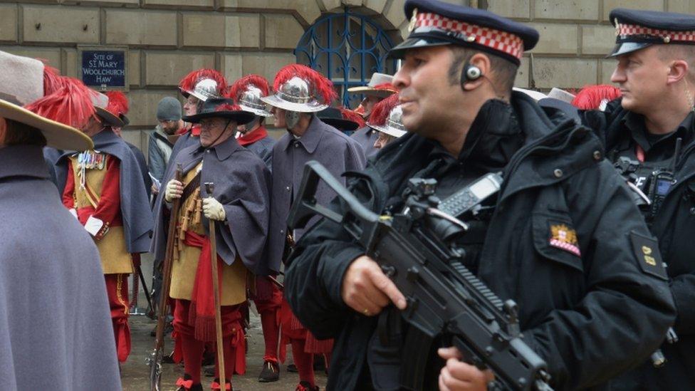 Armed police at the carnival