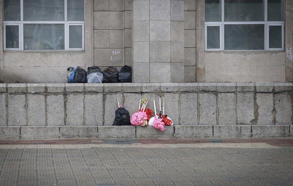 Bouquets of decorative flowers belonging to North Koreans who have gathered, are placed at the Kim Il Sung Square on Friday, 6 May 2016, in Pyongyang, North Korea.