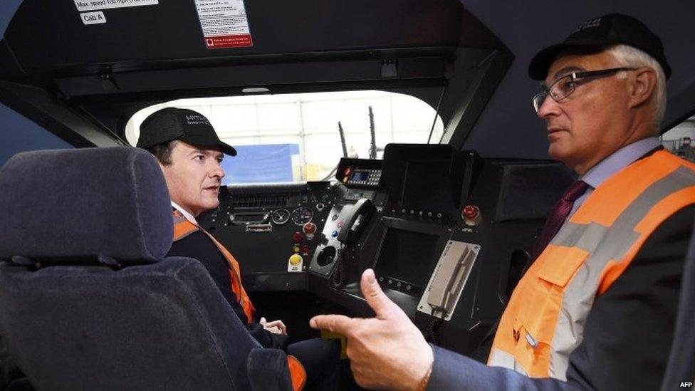 George Osborne with his predecessor Alistair Darling at a train factory